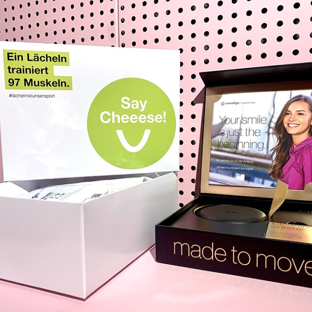 Opened SayCheeese box and aligner packaging, ready for handover